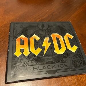 AC/DC Black Ice Album with Yellow and Black Design